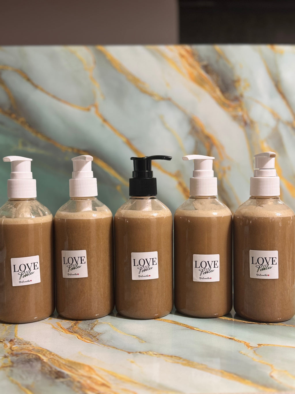Creamy Black Soap Face Cleansing Wash, or Bodywash. Has an Special Blend of Nourishing oils and Butters.. Crafted from traditional African black soap, this gentle cleanser removes impurities while maintaining your skin's natural moisture balance.